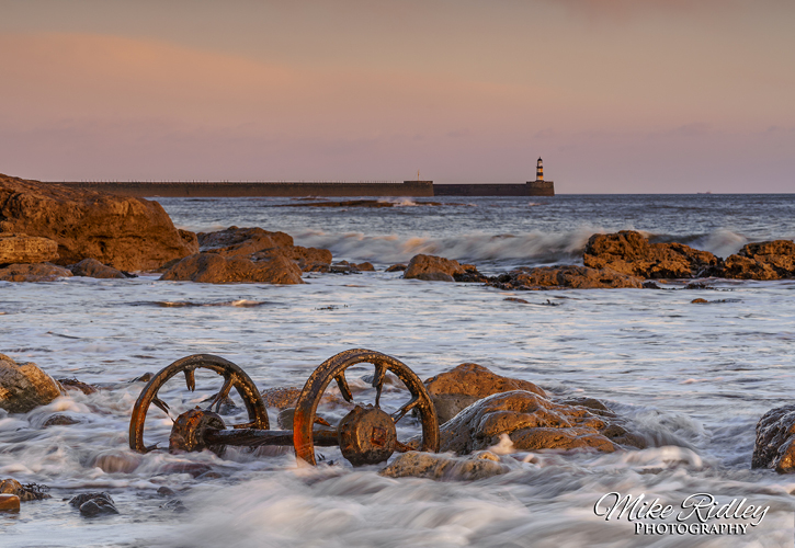 Seaham beach with lighthouse in background by Mike Ridley